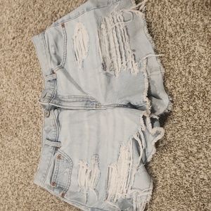 Distressed light blue jean shorts